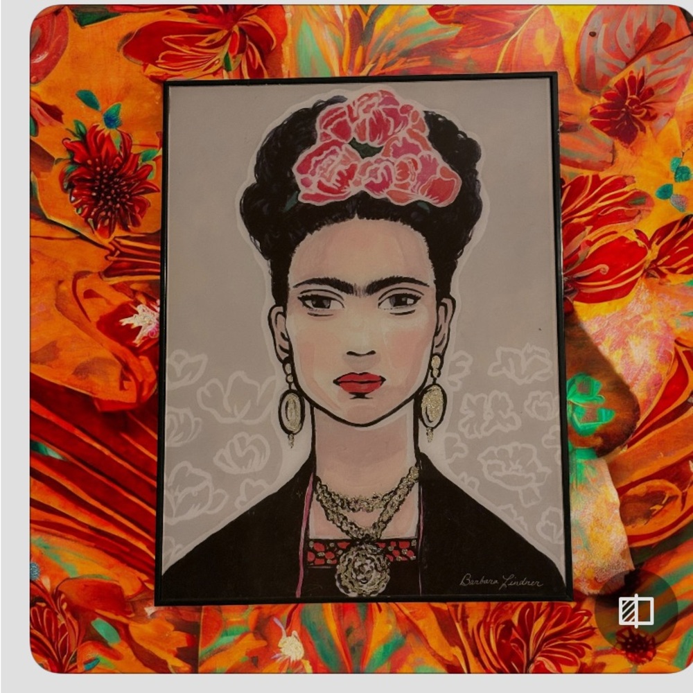 Vibrant floral print of Frida Kahlo with original frame